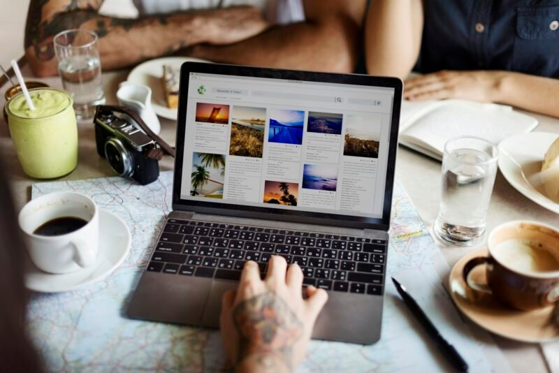 Person Browsing Internet On Laptop Concept